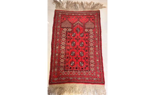 Tapis en laine points noués à décor géom