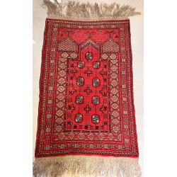 Tapis en laine points noués à décor géom