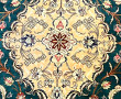 Tapis en laine et soie à décor central d