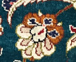 Tapis en laine et soie à décor central d