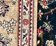 Tapis en laine et soie à décor central d