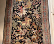 Tapis en laine et soie à décor d'une scè
