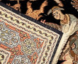 Tapis en laine et soie à décor d'une scè