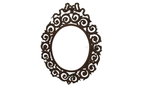 Miroir ancien de forme ovale en métal à 
