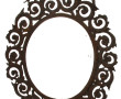 Miroir ancien de forme ovale en métal à 