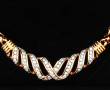 SWAROVSKI - Collier en métal doré et str