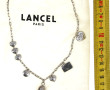 LANCEL - Sautoir avec breloques en métal