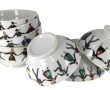 7 bols en porcelaine à décor de ronde de