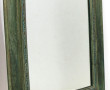 Miroir à encadrement en bois patiné vert