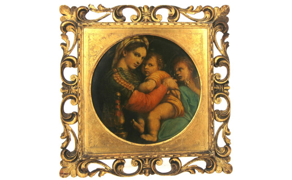 Cadre en bois sculpté et doré, décor de 