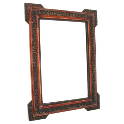 Miroir en bois et stuc à patine cuivré e