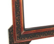 Miroir en bois et stuc à patine cuivré e
