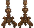 Paire de flambeaux anciens en bois sculp