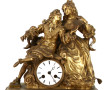 Pendule de cheminée en bronze doré, à dé