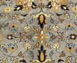 Tapis en laine points noués à décor de r