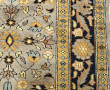 Tapis en laine points noués à décor de r