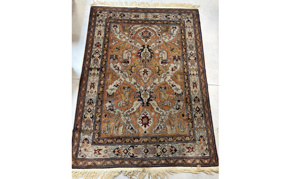 Tapis en laine points noués à décor de l