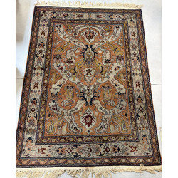 Tapis en laine points noués à décor de l