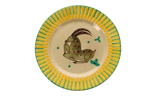 Assiette en faïence à décor d'un cervidé