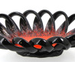 Coupe ovale en faïence noire et orangée,