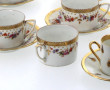 Série de 9 tasses et 6 sous tasses en po