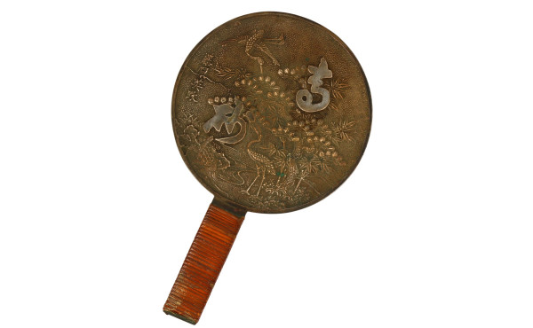 Miroir chinois rond en bronze à décor de