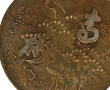 Miroir chinois rond en bronze à décor de