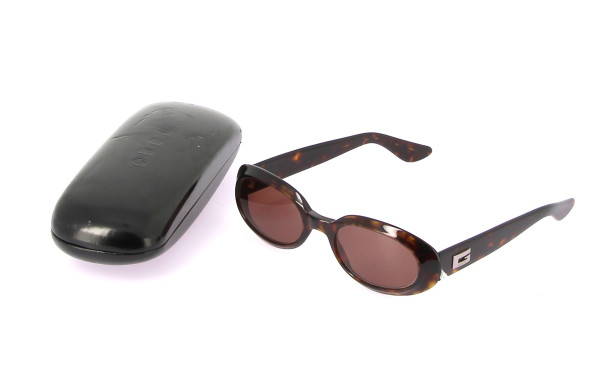 GUCCI - Paire de solaires femme, avec ét