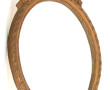 Miroir ovale à décor de nœud de ruban, H