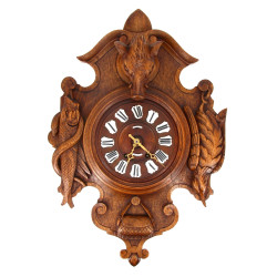 Pendule en bois sculpté avec tête de san