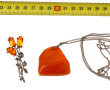 Lot comprenant 2 pendentifs couleur ambr