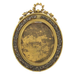Cadre XIXème en bronze doré et argenté à