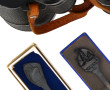 Paire de jumelles anciennes en étui cuir