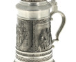 Chope à bière en étain à décor de scènes