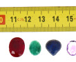 Lot de 4 pierres sur papier : rubis, éme