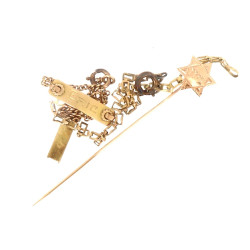 Epingle à cravate en or 18 carats : on y
