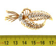 Broche en jaune 18 carats, poinçon tête 