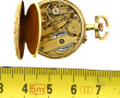 Petite montre de col en or jaune 18 cara
