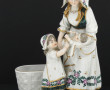 Groupe en porcelaine blanche et or à déc