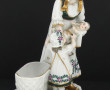Groupe en porcelaine blanche et or à déc
