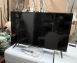 Ecran TV de marque TUCSON, H 48,5 x L 73
