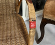 Trois fauteuils en rotin (du scotch roug