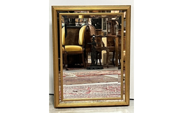 Miroir moderne doré à parecloses
