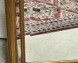 Miroir moderne doré à parecloses
