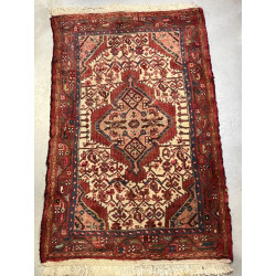 tapis iranien en laine points noués, ton