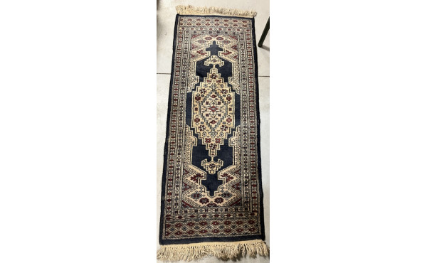 Petit tapis pakistanais en laine à domin