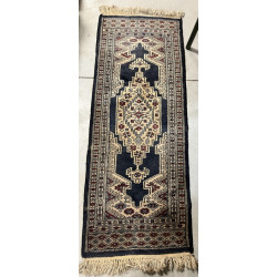 Petit tapis pakistanais en laine à domin