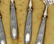 Louche à crème et 4 petits couverts de s