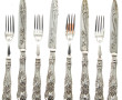 12 fourchettes et 8 couteaux en métal ar