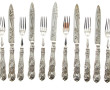 12 fourchettes et 8 couteaux en métal ar